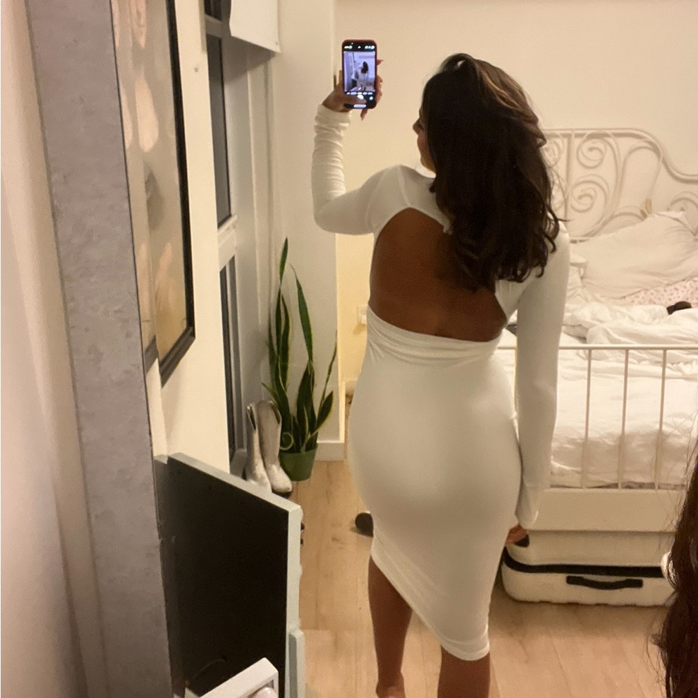 Public Desire, backless dress!